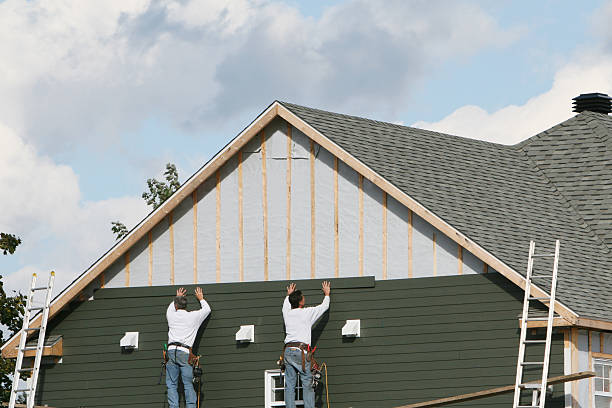 Professional Siding Replacement technician working in Pittsboro, NC